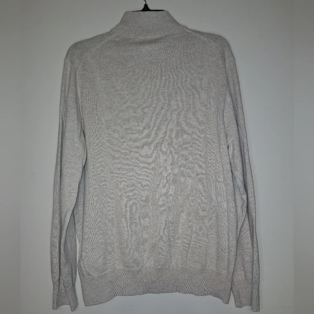 A J.Crew 100% cotton turtleneck sweater in a men's size large. EUC.